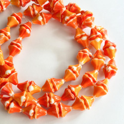 White bells with red and...