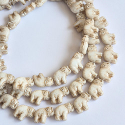 White elephants with beige...