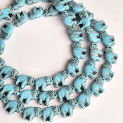 Blue elephants with black...