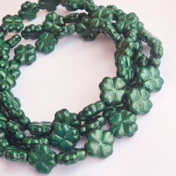 Dark green silky glass clovers